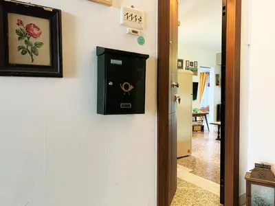 a door to a room with a safe on the wall at Vintage Apartment in Athens