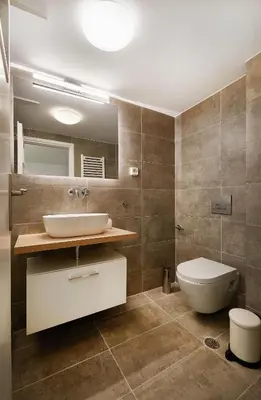 a bathroom with a sink and a toilet at Chloe Boutique Apartments Nikis in Athens