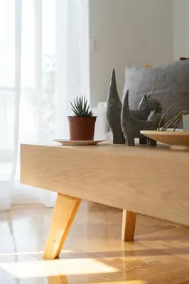 a wooden coffee table with plants on top of it at The Athens Gathering, Hip area and sightseeing in Athens