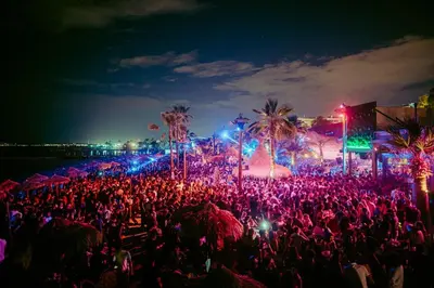 a crowd of people at a concert at night at Xcite Hotel Salem in Athens