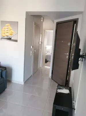 a room with a hallway with a door and a room at 7-Athens new morden comfortable-center,metro,private parking in Athens