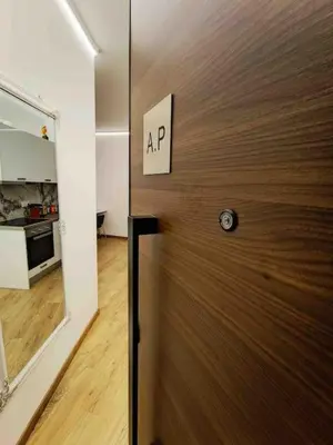 a door in a room with a sign on it at A.P Athens in Athens