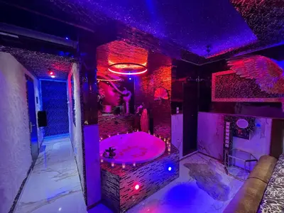 a bathroom with a pink sink in a room at Priamos Hotel Erato in Athens