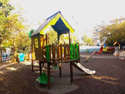 a playground in a park with a play structure at The frescamento.collection apartment in Athens