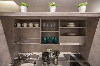 a kitchen with a sink and a counter top at A11 Pristine & comfy studio near Plaka & Parthenon in Athens