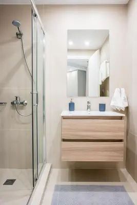 a bathroom with a shower and a sink at A24 Pristine & sunny suite near Plaka & Parthenon in Athens