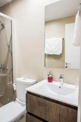 a bathroom with a sink and a toilet and a shower at A22 Premium flat with balcony in the centre in Athens