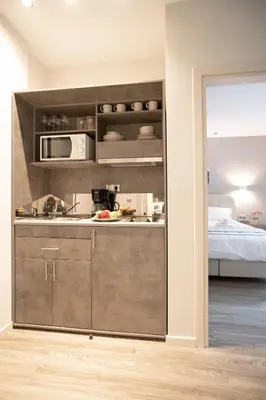 a kitchen with a sink and a microwave at A14 Sunny & chic 2Room apartment near Plaka & Parthenon in Athens