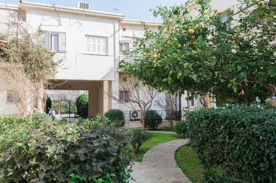 a walkway in front of a building at Unique 2BR Apartment in Filothei by UPSTREET in Athens