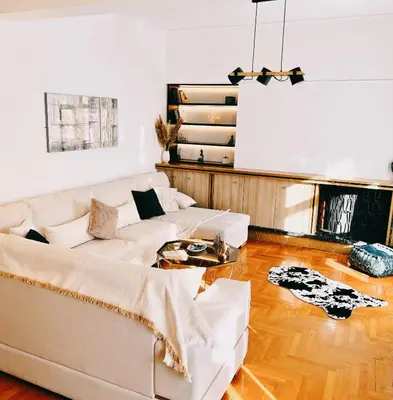 a living room with a couch and a table at Seaside apartment in Flisvos marina in Athens