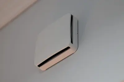 a close up of a clock on a wall at Modern-Lux Central 1 Bedroom Condo in Athens