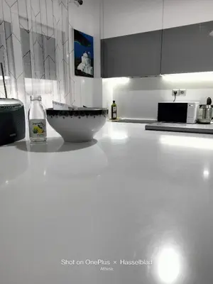 a kitchen counter with a bowl on top of it at Modern-Lux Central 1 Bedroom Condo in Athens