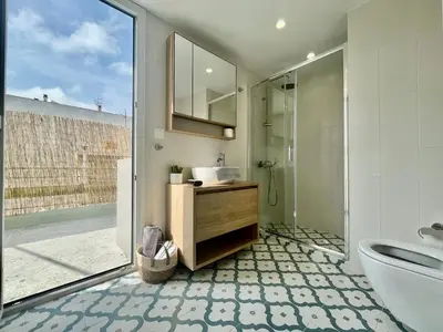 a bathroom with a sink and a toilet and a mirror at CK apartment view acropole in Athens