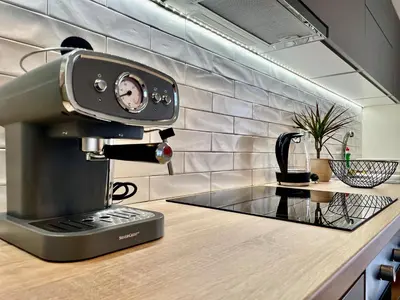 a kitchen with a coffee maker on a counter at CK apartment view acropole in Athens