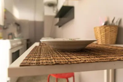 a bowl sitting on top of a counter in a kitchen at Nice Apartment Near City Center in Athens