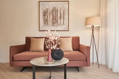a living room with a couch and a table at Hestia - Asklipiou 61 in Athens