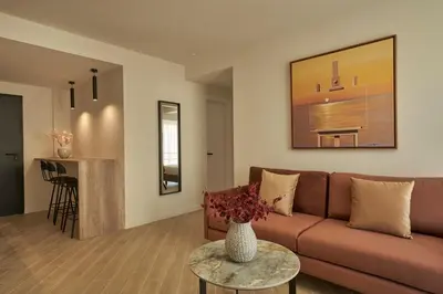 a living room with a couch and a table at Hestia - Asklipiou 61 in Athens