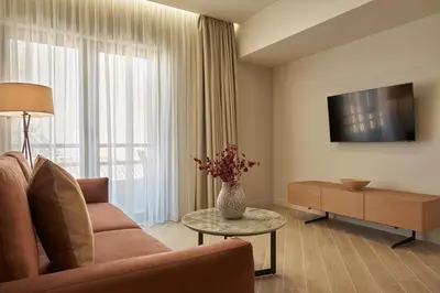 a living room with a couch and a table at Hestia - Asklipiou 61 in Athens