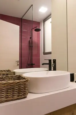 a bathroom with two sinks and a mirror at Athens Special in Athens