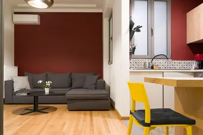 a living room with a couch and a table at Athens Special in Athens