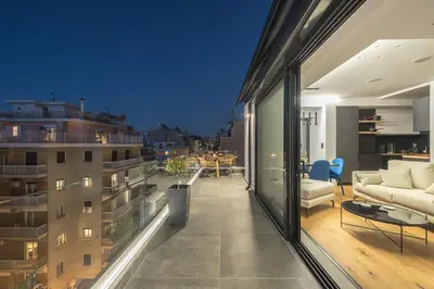 a living room with a view of a building at The 