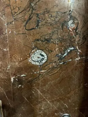 a ceiling of a bathroom with a marble floor at So Athens - Luminous duplex apt in Plaka, Acropolis views in Athens