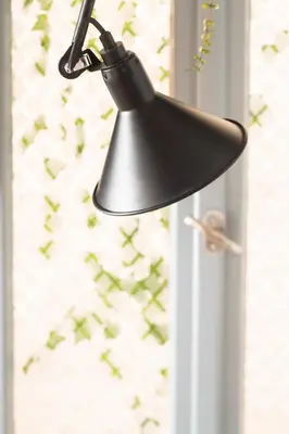 a black lamp hanging from a door with a window at Museum Apartment - Fix B, Athens in Athens