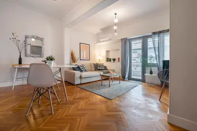 a living room with a couch and a table at Museum Apartment - Fix B, Athens in Athens