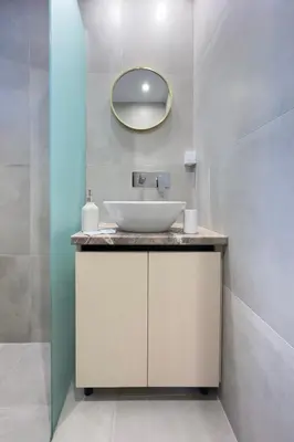 a bathroom with a sink and a mirror at Stylish Living - Iro in Athens