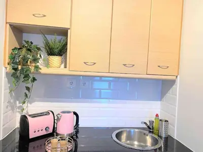 a kitchen with a sink and a counter top at NEW AmazingLarge Luxury 4BR Suite/1min toAcropolis in Athens