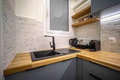 a kitchen with a sink and a counter at 