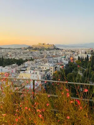 a view of the city of athens from afar at Acropolis Residence #Rooftop#360-Degree City Views #Unoblu in Athens