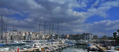 a bunch of boats are docked in a marina at Piraeus Port Exclusive in Piraeus