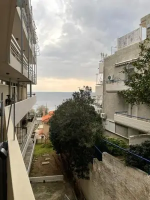a view of an alley between two buildings at Sophia's apartment in Saronida