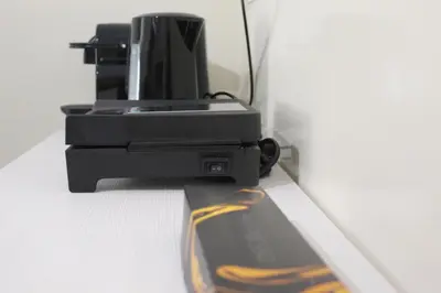 a black printer sitting on top of a table at Suite 2 Bedrooms in Athens