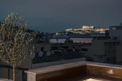a view of the city from the roof of a building at Parthenon Dream, breathtaking views with massage chair in Athens