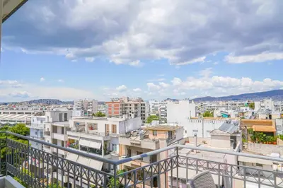 a view of a city from a balcony at Lis153 by Smart Cozy Suites - Top Floors with Amazing City View - Available 24hr in Athens