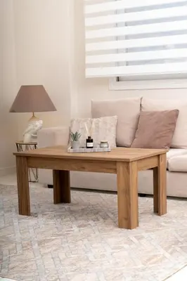 a wooden coffee table in a living room with a couch at Ozone Complex by A&D Properties in Porto Rafti