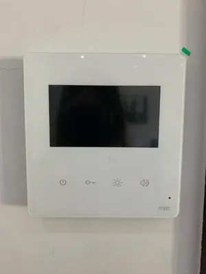 a white microwave with a window on a wall at Olvias Apartment in Athens