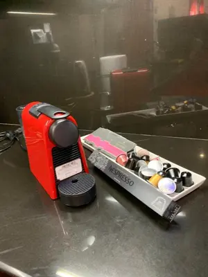 a toaster sitting on a counter with a box of paint at Olvias Apartment in Athens