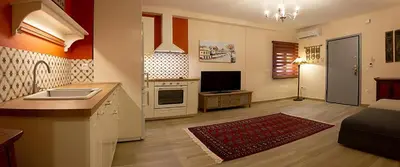 a kitchen with a sink and a counter top at Αcacia House - Fully Equipped Apartment in Glyfada in Athens
