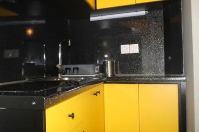 a kitchen with a sink and a yellow cabinet at Athens City Themis 12 in Athens