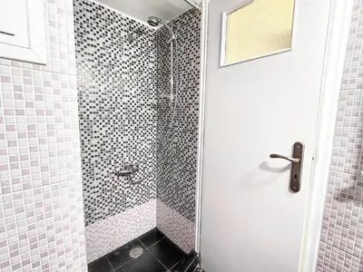 a bathroom with a shower with a glass door at As ✓Two bedroom apartment in thissio in Athens