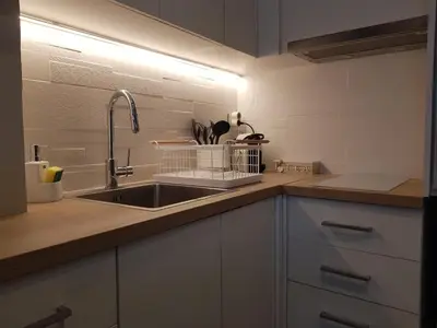 a kitchen with a sink and a counter top at Elegant House With Acropolis View in Athens