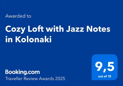 a blue sign with the text cozy lot with jazz notes in kholm at Cozy Loft with Jazz Notes in Kolonaki in Athens