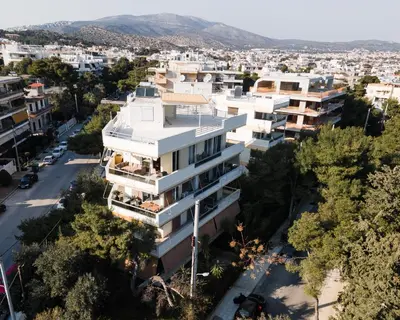 an aerial view of a building in a city at Athenian Riviera Sea View Penthouse in Vari