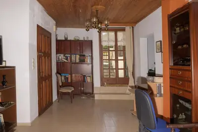 a room with a hallway with a desk and a chair at Marin Holiday in Dhaskalión