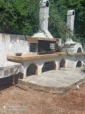 a model of a play house with a fireplace at Cozy Studio in Athens