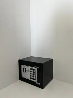 a black microwave sitting on top of a table at Zeus Bright & New Apartment - 25' walk to the Acropolis in Athens