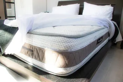a mattress sitting on a table in a bedroom at Athens Hills in Athens